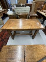 20th cent. Oak small plank top table with cleated ends on square legs joined by an H stretcher,