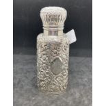 Hallmarked Silver: Cologne bottle, Birmingham 1890 with elaborate repoussage case, hinged lid, the