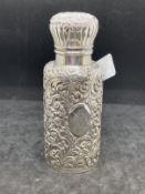 Hallmarked Silver: Cologne bottle, Birmingham 1890 with elaborate repoussage case, hinged lid, the