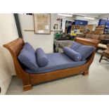 20th cent. Cherry wood sleigh end day bed bears makers label Simon Horn Furniture, London. 58ins.
