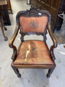 Indian rosewood Durbar chair. Early 20th cent. Indian rosewood armchair with carved shaped back