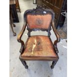 Indian rosewood Durbar chair. Early 20th cent. Indian rosewood armchair with carved shaped back