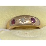 Hallmarked Jewellery: Ring 18ct gold tapering band set with two rubies, estimated weight of (2) 0.