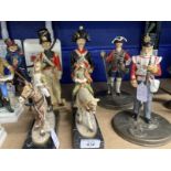 20th cent. Military figures in 18th/19th cent. costume, D.L.I. Queen's Lancers Reg (height 9ins),