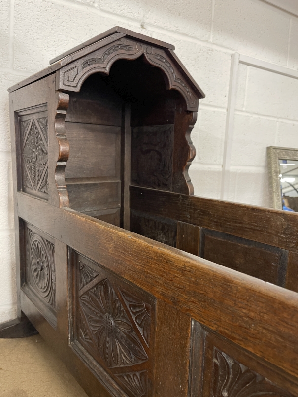 19th cent. Carved oak cradle, shaped hood above carved rockers. - Image 2 of 2