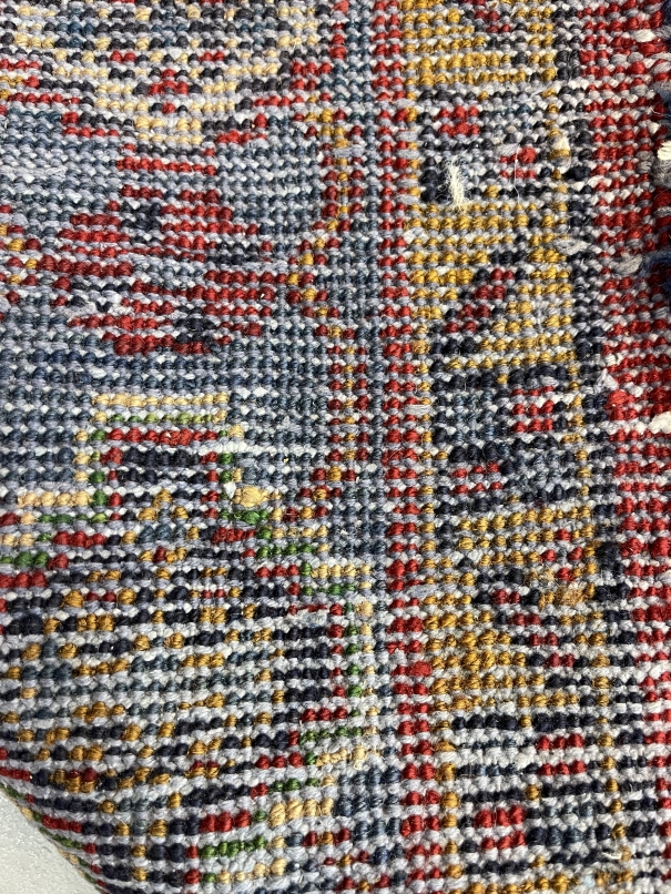 Carpets: Iranian carpet predominantly red and blue ground, small animal motifs. 124ins. x 87ins. - Image 2 of 2