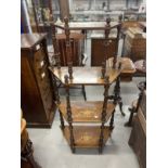 Late 19th/early 20th cent. Mahogany whatnot, four tiers with turned supports and trapezium shaped