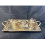White metal Chinese silver three piece tea set and rectangular tray, 19ins. x 11½ins, with two