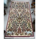 Carpets: 20th cent. Persian rug with animal and bird motifs. 79ins. x 42ins.