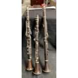 Musical Instruments: Woodwind, three late 19th/early 20th cent. Class C rosewood and nickel