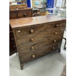 19th cent. Mahogany chest of two over three long drawers, turned knob handles on bracket feet.