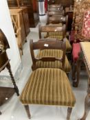 19th cent. Set of six Victorian upholstered mahogany dining chairs with sabre rear and turned