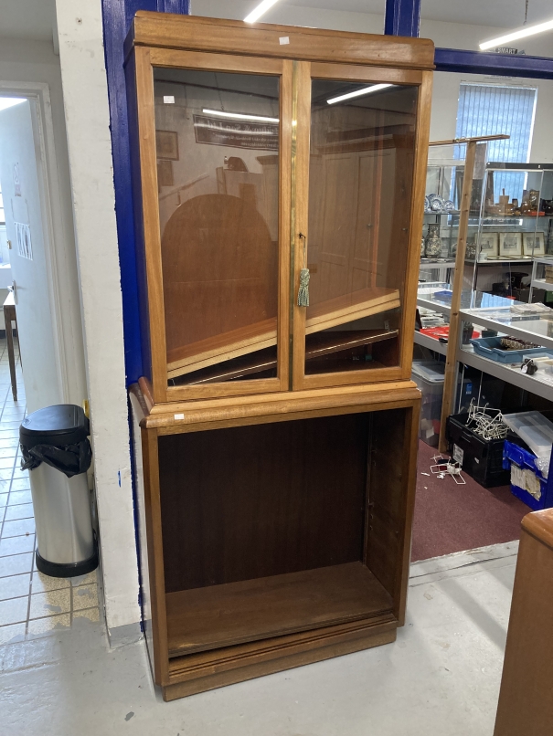 20th cent. Mahogany glazed top bookcase, two glass doors with three shelves above an open cupboard