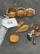 Jewellery: White metal bracelet with six panels each set with amber, length of bracelet 7ins,