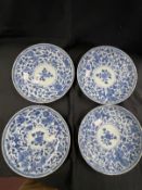 Early 19th cent. Chinese blue and white plates a pair with central panel of flowers in a double