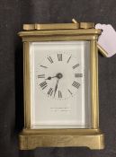 Clocks: Brass carriage clock white enamel face, Roman numerals, signed Jas Murray & Co. London/