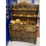 20th cent. Oak dresser and rack, the top with two shelves, the base with two drawers above two doors