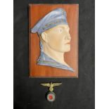 Militaria: Unusual ceramic Kriegsmarine plaque depicting a sailor mounted on board. 6½ins. Plus a