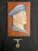 Militaria: Unusual ceramic Kriegsmarine plaque depicting a sailor mounted on board. 6½ins. Plus a