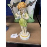 20th cent. Ceramics: Royal Worcester figurine Wednesday's Child No.3521, green dress, blue teddy,