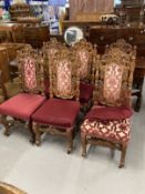 Early 20th cent. Oak Carolean revival chairs with pierced and carved backs, carved scrolled legs
