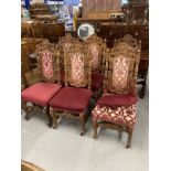 Early 20th cent. Oak Carolean revival chairs with pierced and carved backs, carved scrolled legs