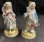 Late 19th/early 20th cent. Continental ceramic figures of a gentleman and lady, the former minor