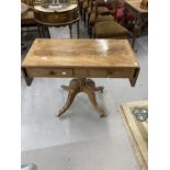 Early 19th cent. Light mahogany sofa table, two drawers and two short drop leaves, on turned support