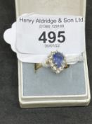 Hallmarked Jewellery: 18ct yellow gold sapphire and diamond thirteen stone heart shaped cluster claw