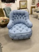 Late 19th cent. Upholstered button back armchair. Depth 35ins. Width 30ins.