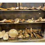 Treen: Cobblers shoe lasts, glove stretchers and a hat block. Approx. 40 items.