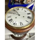 Clocks: Mahogany cased circular wall clock, spring movement, white painted dial, Roman numerals.