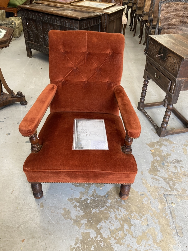 Gillows: Late Victorian walnut framed button back library stuff over arms armchair, rear leg stamped