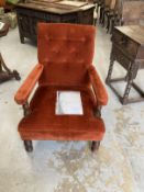 Gillows: Late Victorian walnut framed button back library stuff over arms armchair, rear leg stamped