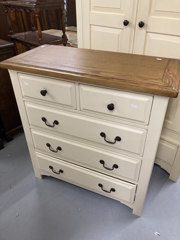 20th cent. Two door wardrobe with moulded oak cornice above two cream painted doors above a single