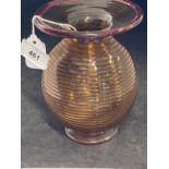 Studio Glass: Bob Crooks b1965. Ribbed overlay vase amber ground with pink spiral and flared rim.
