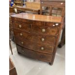 Early 19th cent. Mahogany bow front chest of two over three drawers with a cross banded top, round