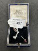 Jewellery: Yellow and white metal brooch in the form of an arrow set with nineteen rubies, estimated