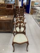 Edwardian inlaid mahogany Hepplewhite style chair, shield shaped backs, cabriole legs, two carvers
