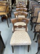 19th cent. Set of six bar back dining chairs on sabre back supports.