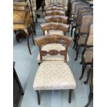 19th cent. Set of six bar back dining chairs on sabre back supports.