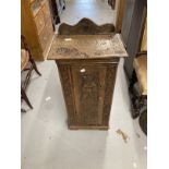 20th cent. Carved oak pot cupboard, mahogany standard lamp and oval mirror.