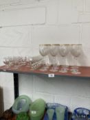 Glass: 19th cent. and later. Set of ten custard cups (2 A/F), a set of twelve wine glasses (1 A/F)