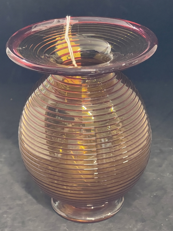 Studio Glass: Bob Crooks b1965. Ribbed overlay vase amber ground with pink spiral and flared rim. - Image 2 of 3