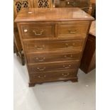 20th cent. Mahogany chest of two over four drawers with brass handles and bracket feet. 31ins. x