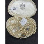 Necklet double row of 7.5mm cultured pearls (99) in each row with two 9ct spacers each set with an