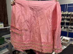 Late 19th/early 20th cent. Taffeta skirts one pink with frill and lace border and one black velvet