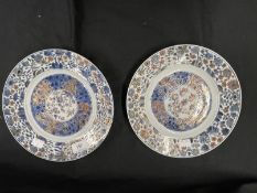 Chinese K'ang-hsi porcelain pair of plates floral motifs Imari polychrome decoration, minor fritting