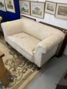 Late 19th cent. Upholstered drop end two seater sofa.
