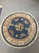 Carpets & Rugs: Chinese hand washed circular rug, blue ground with a central panel depicting